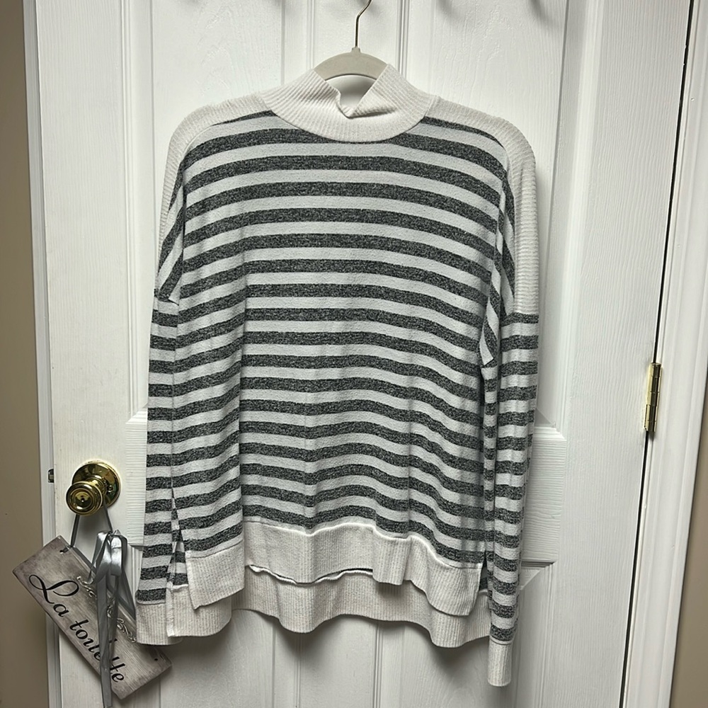 White and grey striped sweater